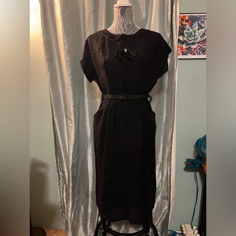 Vintage, union made, has pockets and belt
